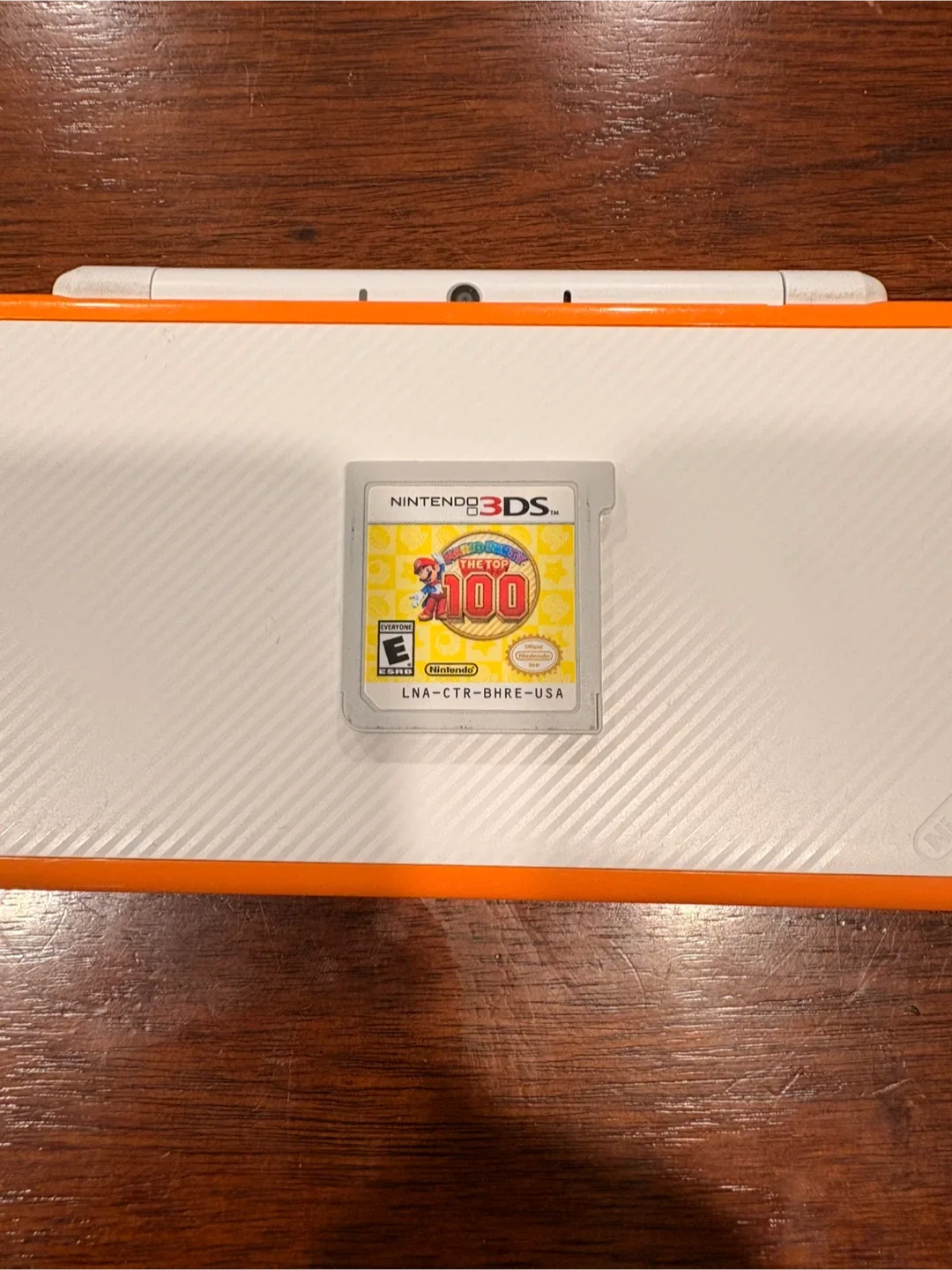 Nintendo 2DS handheld console with charger image indicator(3)