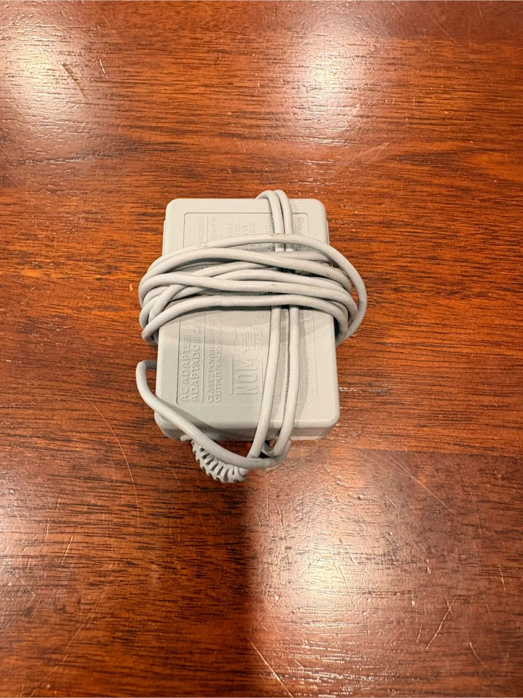 Nintendo 2DS handheld console with charger image indicator(5)