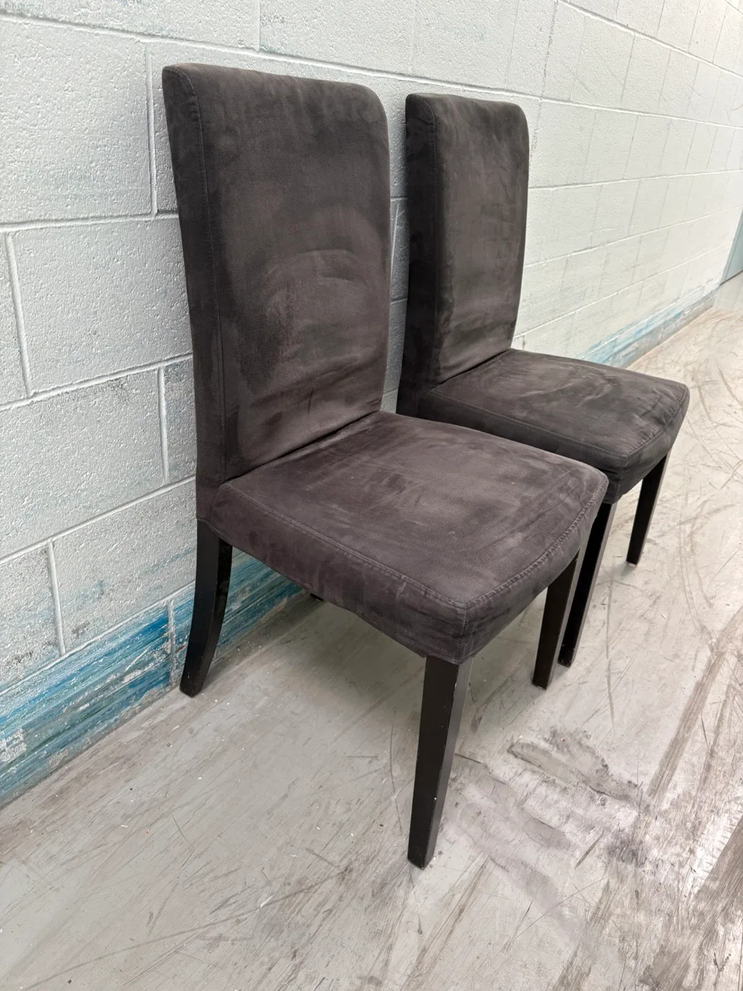 Two greyish Upholstered Dining Chairs image indicator(4)
