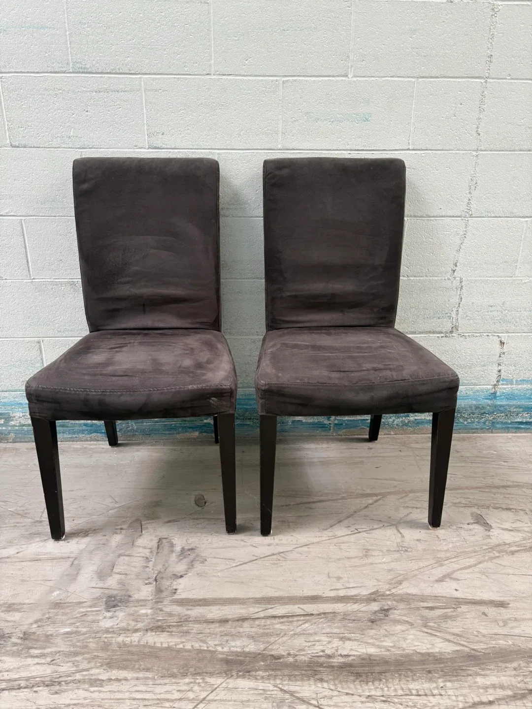 Two greyish Upholstered Dining Chairs image indicator(2)