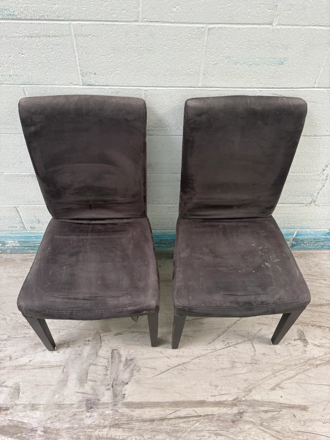 Two greyish Upholstered Dining Chairs image indicator(3)