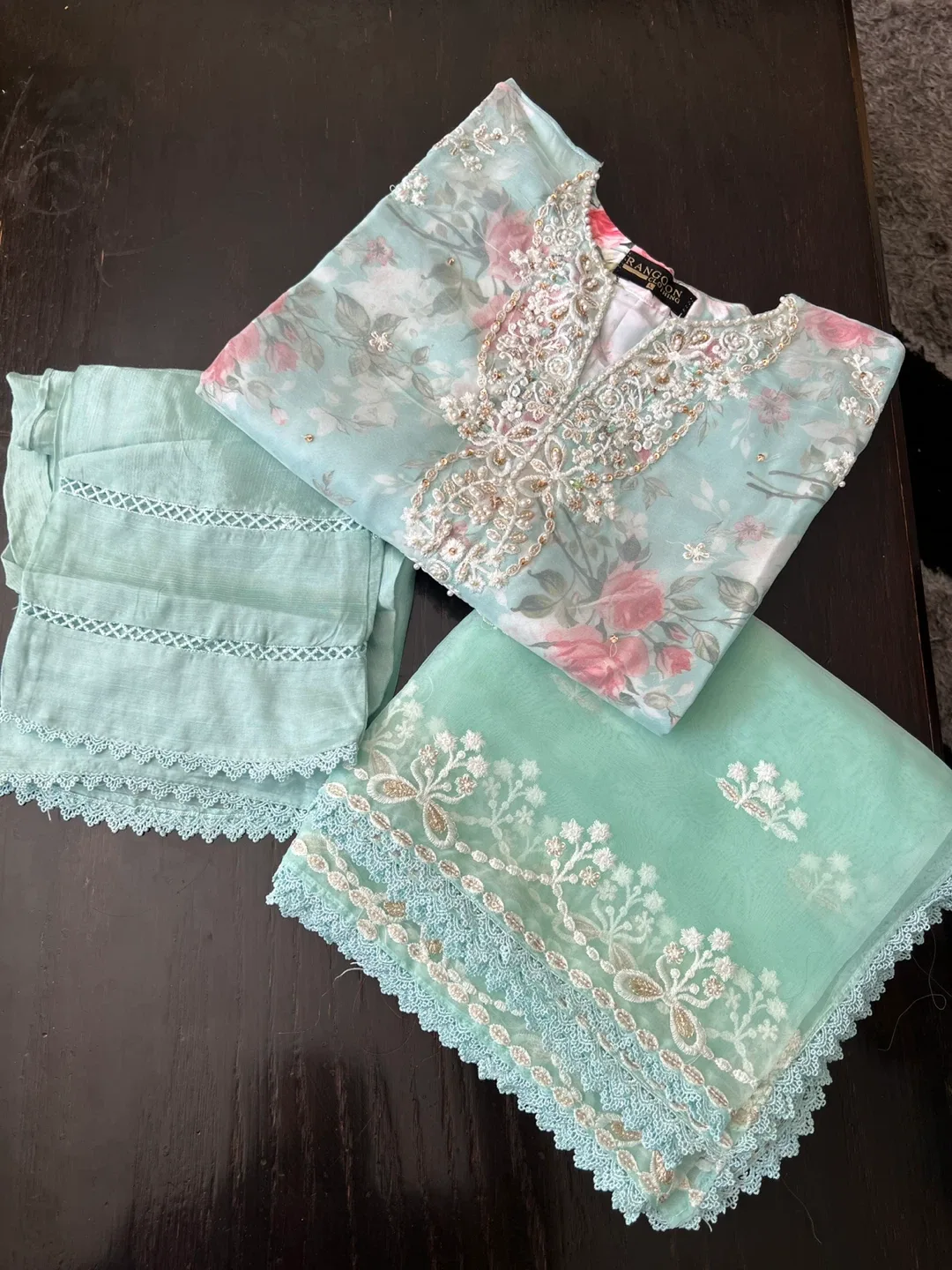 Beautiful Turquoise colour fancy embroidered organza suit image indicator(2)