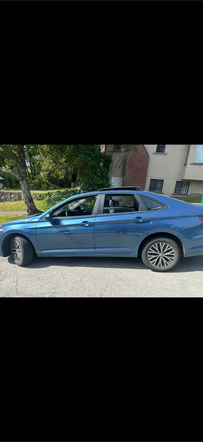 Volkswagen Jetta - Blue Sedan image indicator(3)