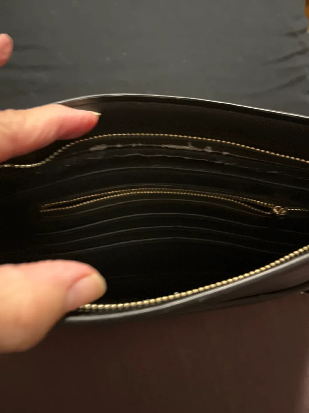 Black Leather Clutch with Arrow Detail image indicator(7)