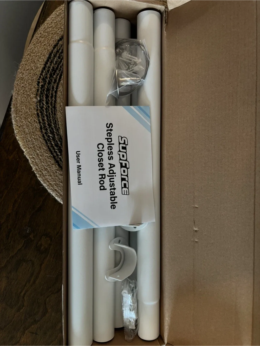 Adjustable closet rod