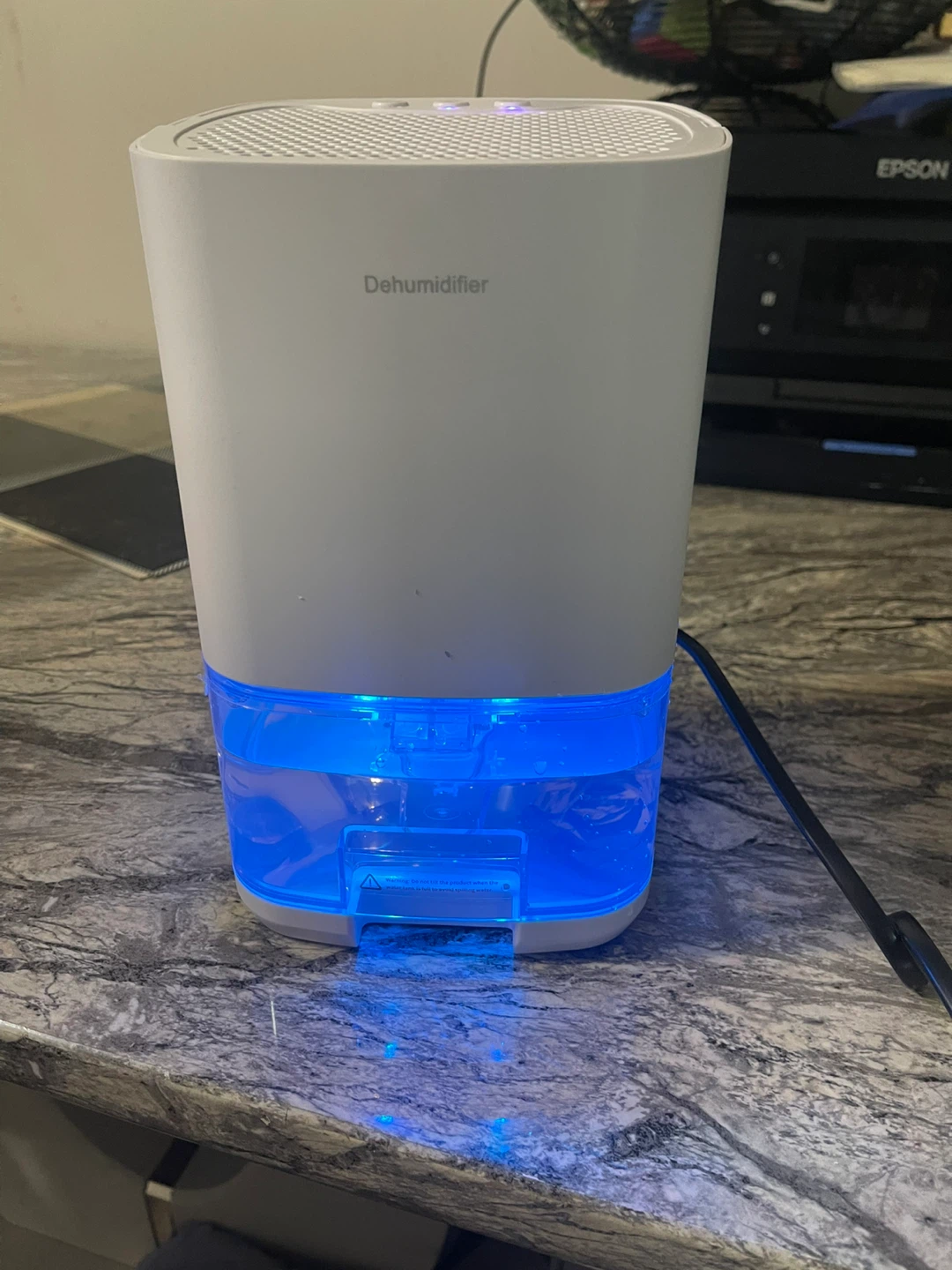 Dehumidifier with Atmosphere Light