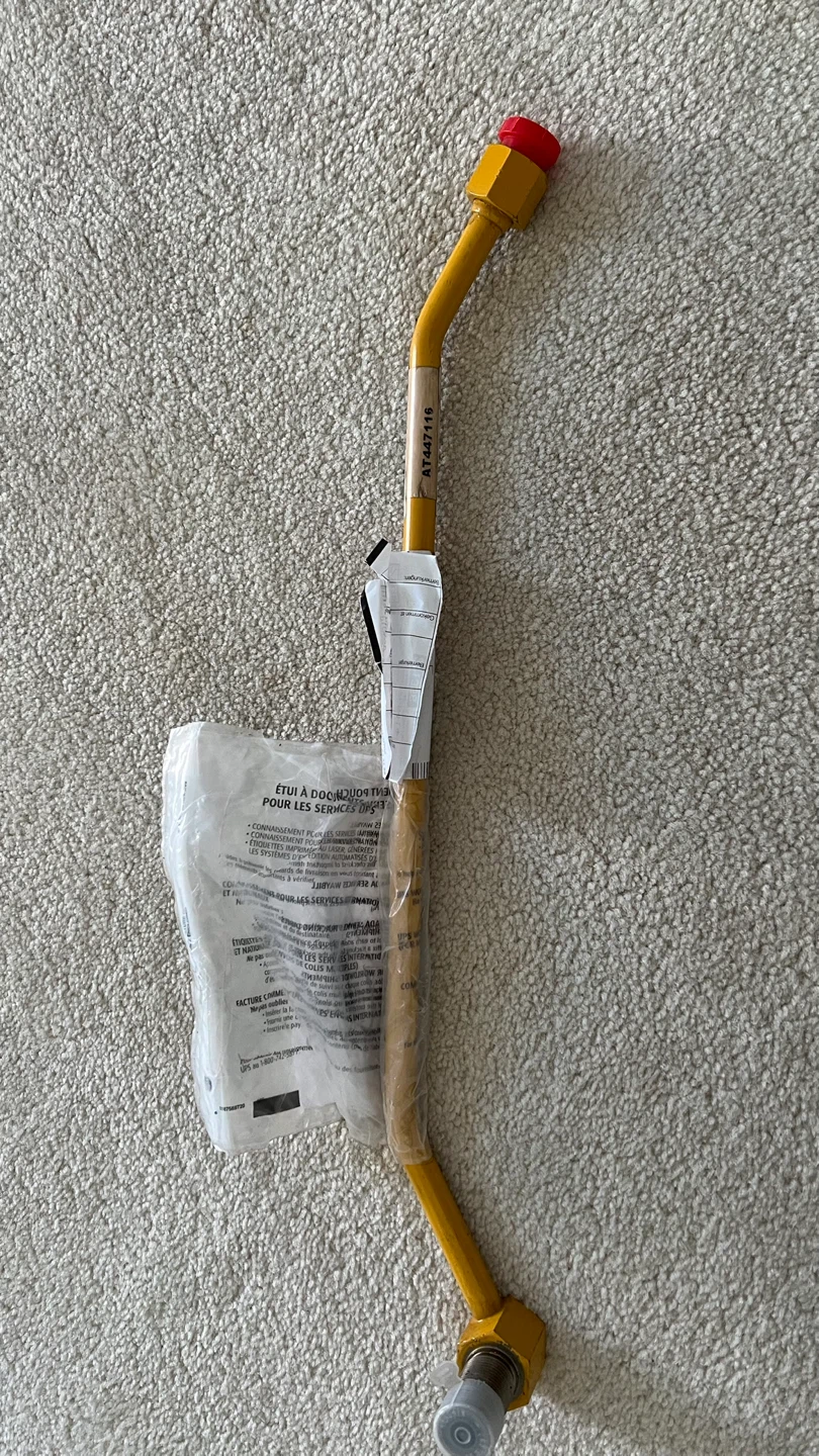 AT447116: Scarifier Hydraulic Oil Line