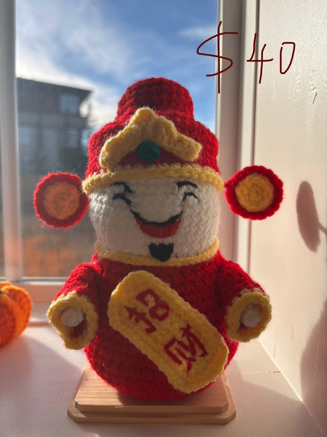 Handmade Crochet God of Wealth Figurine - $40