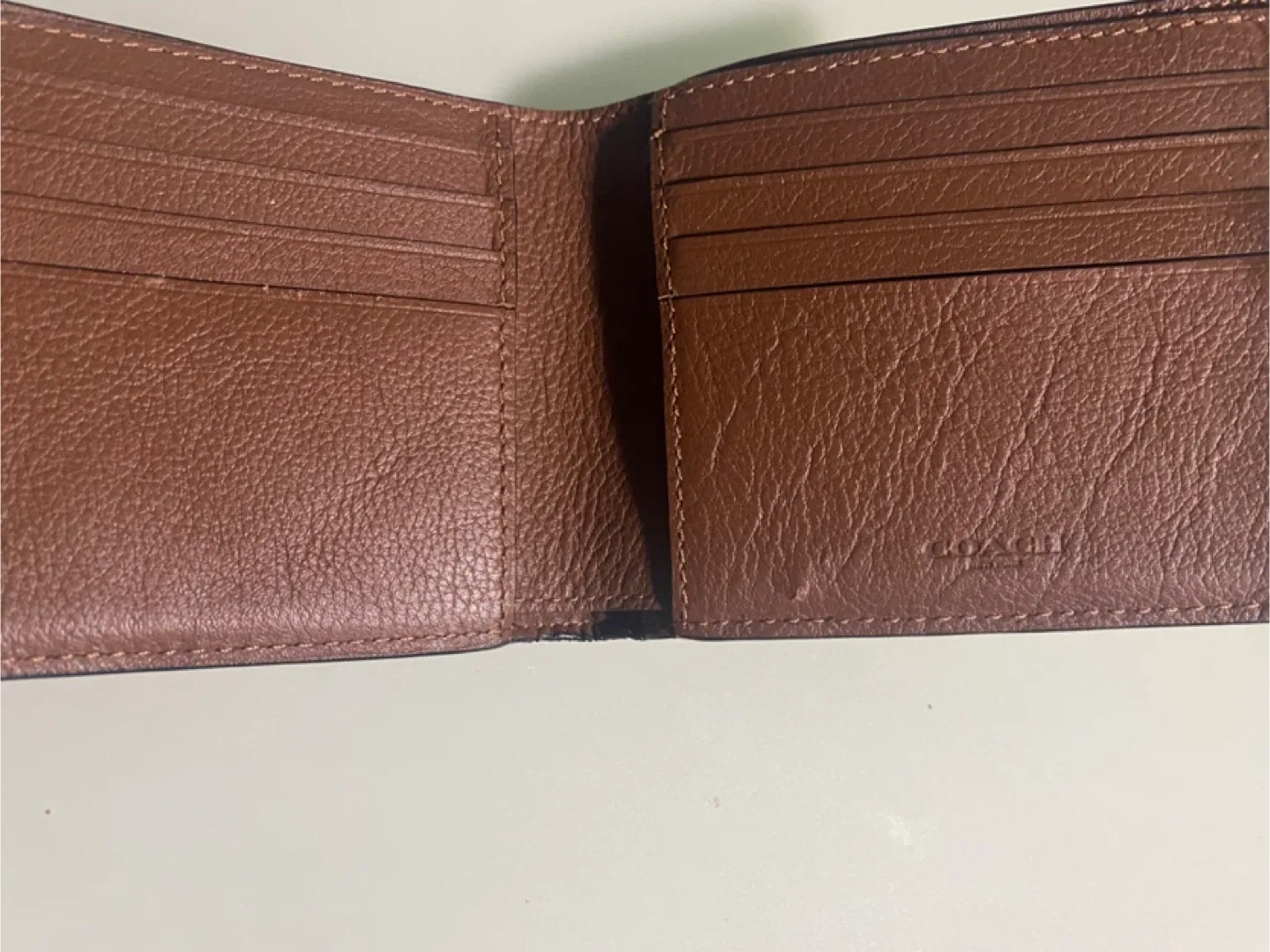 Men’s Coach wallet image indicator(2)