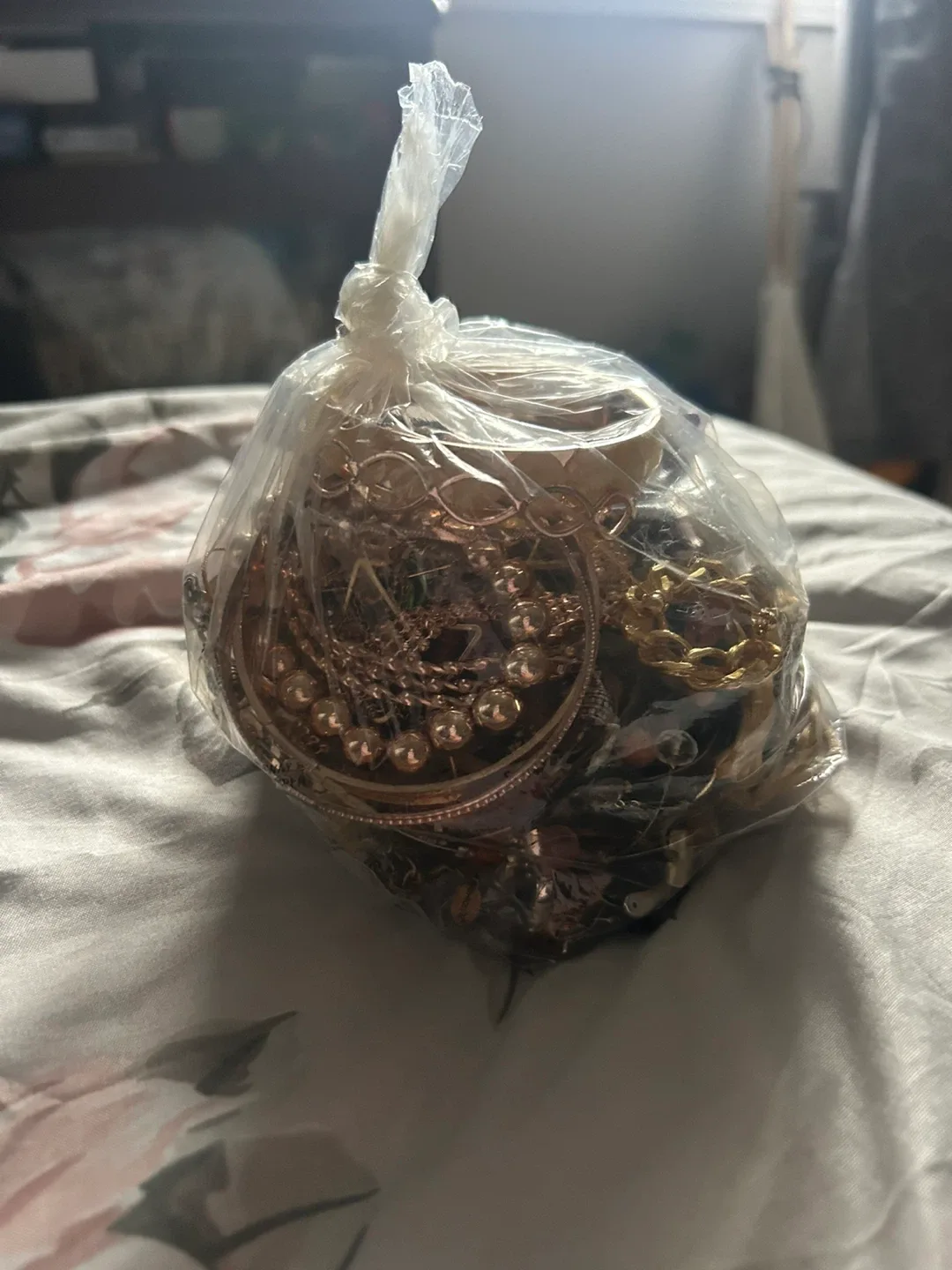 Bag of assorted jewelry