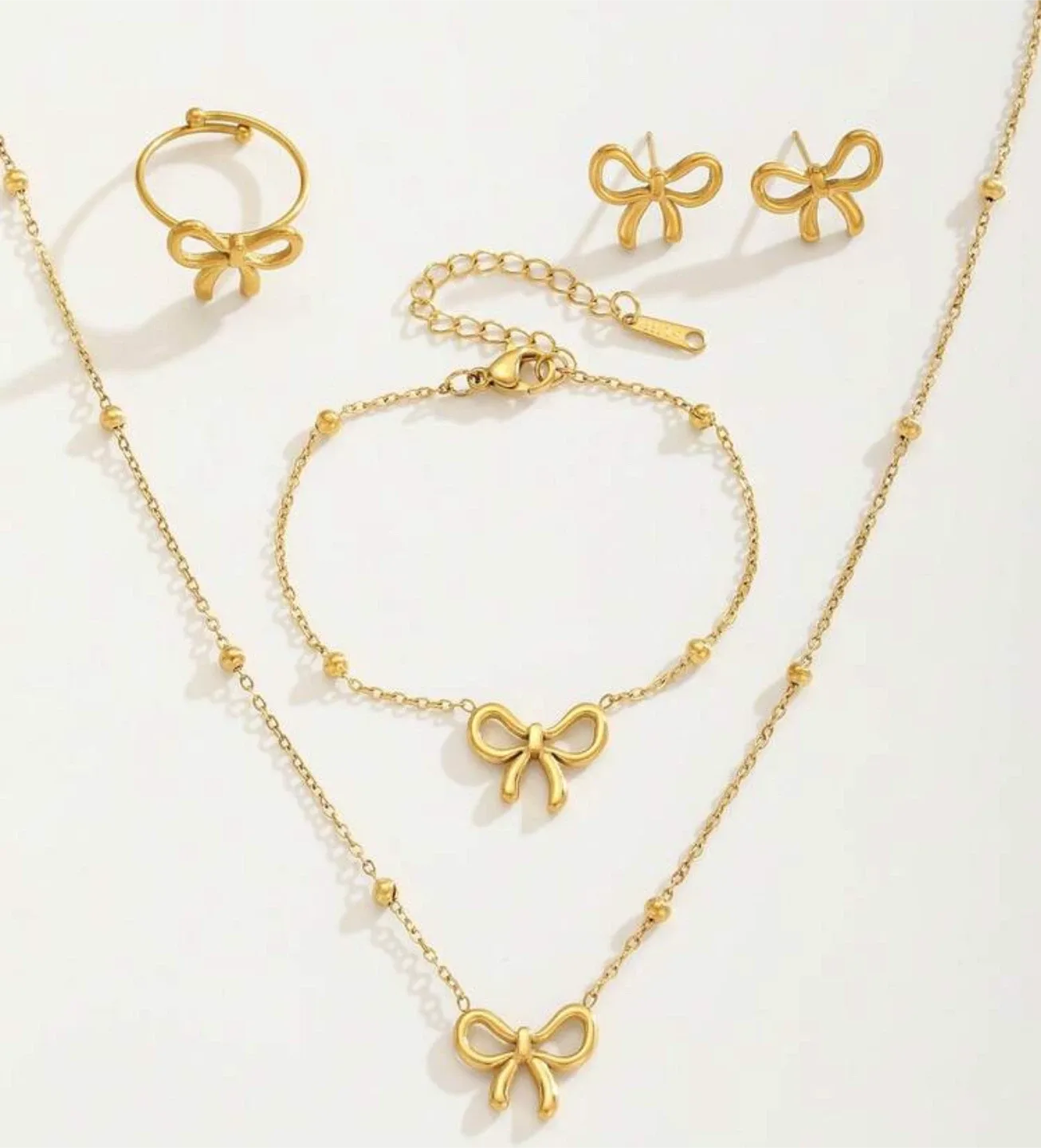 Gold Bow Jewelry Set - Necklace, Bracelet, Ring, Earrings image indicator(3)