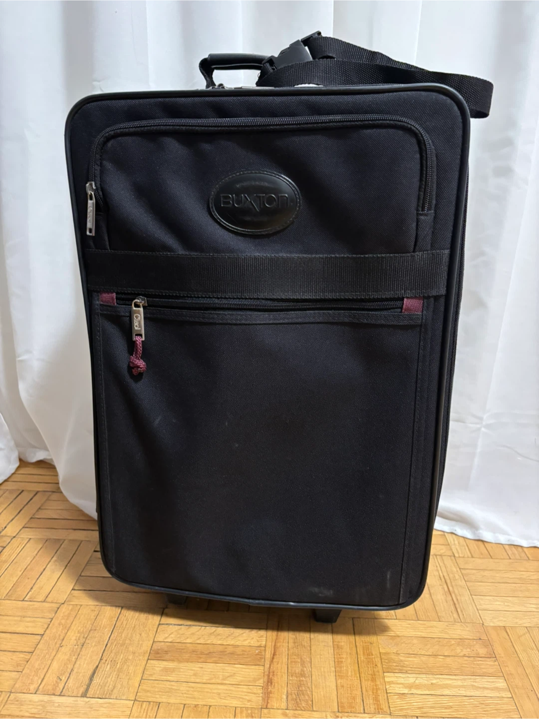 Buxton Black Rolling Suitcase