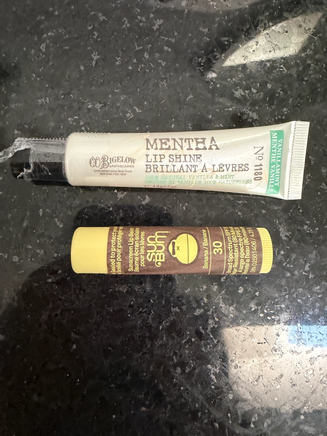 Bigelow Mentha Lip Shine in No. 1100 mint + sun bum lip balm