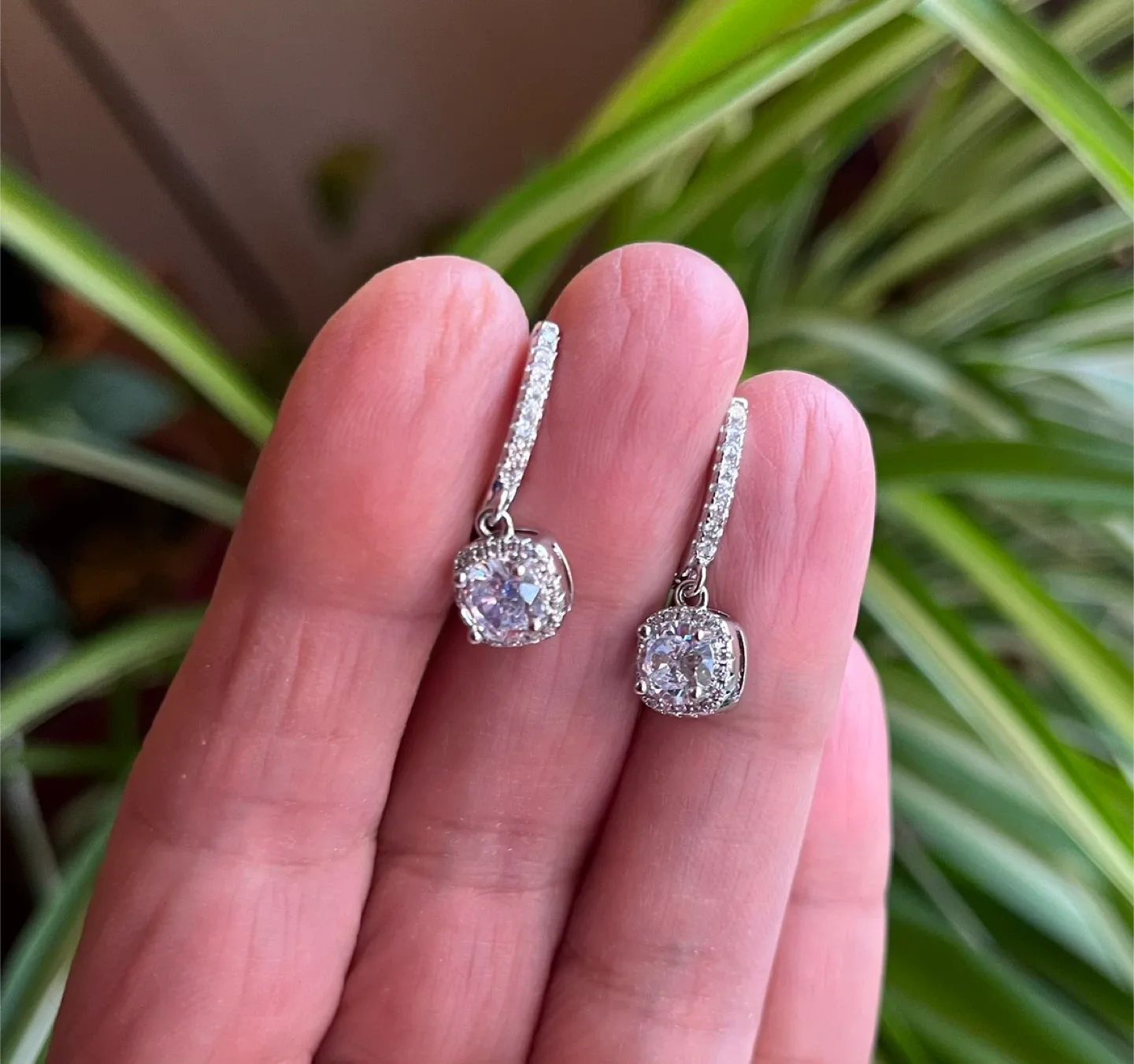 Moissanite silver plated dangle earrings.Silver plated