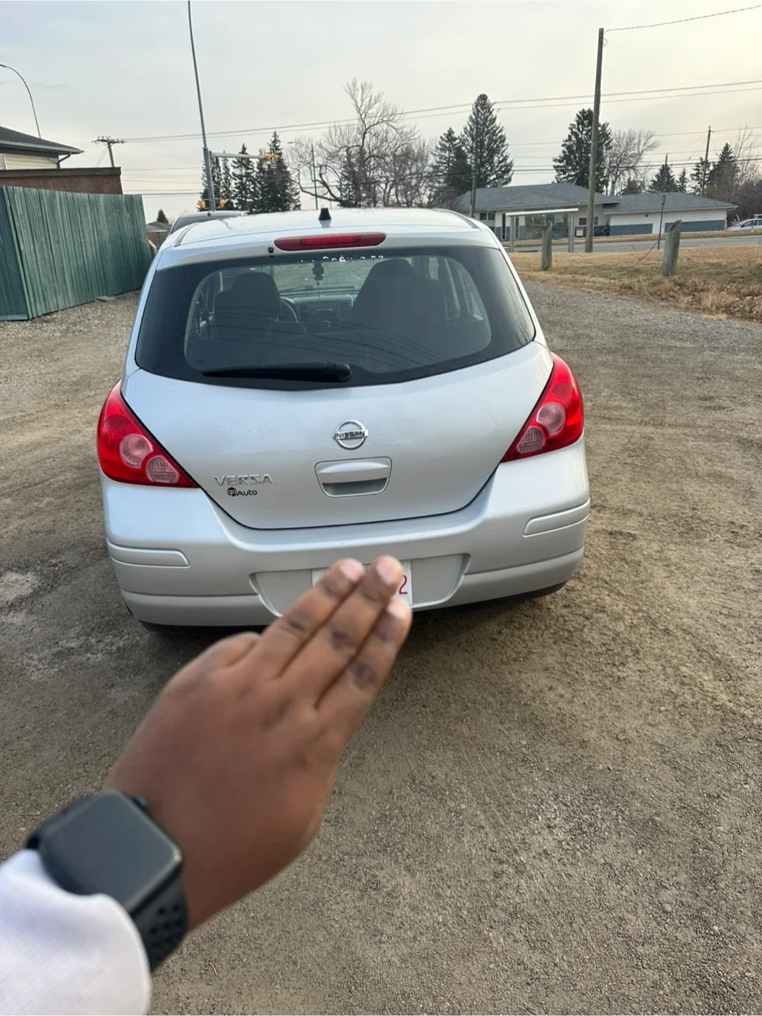 Silver Nissan Versa image indicator(9)