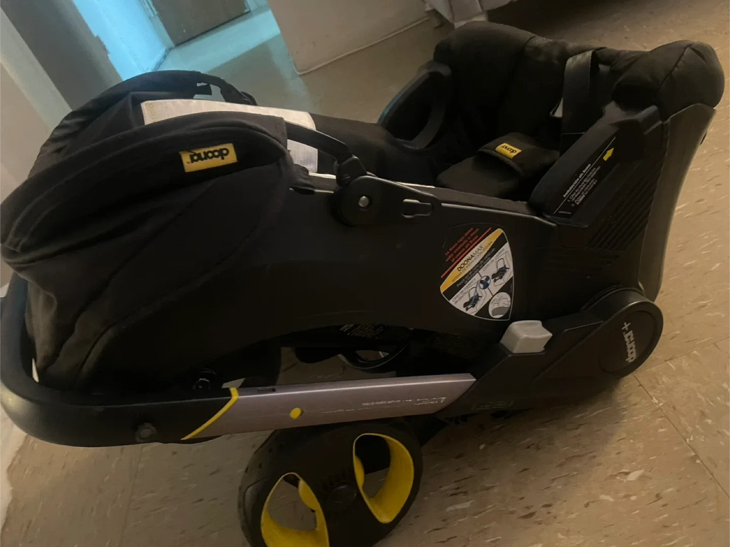 Doona Infant Car Seat Stroller - Black no base image indicator(7)