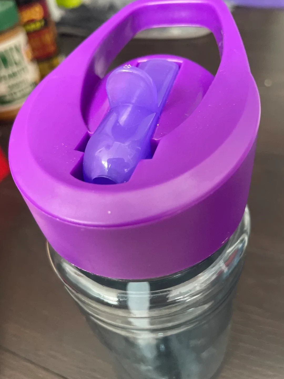 New Water Bottle with Purple Lid thumbnail