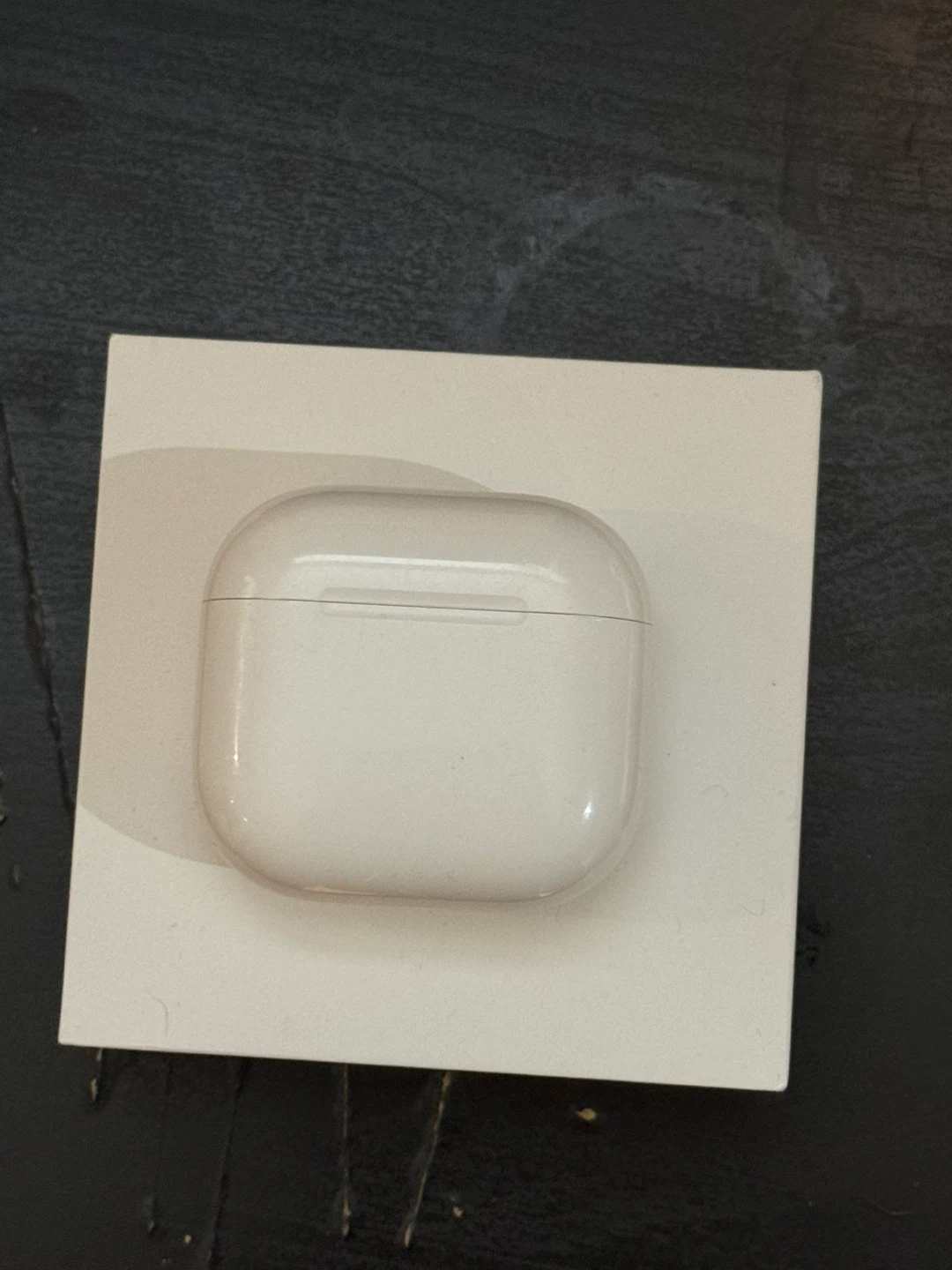 Apple AirPods 4 with Charging Case - photo 3