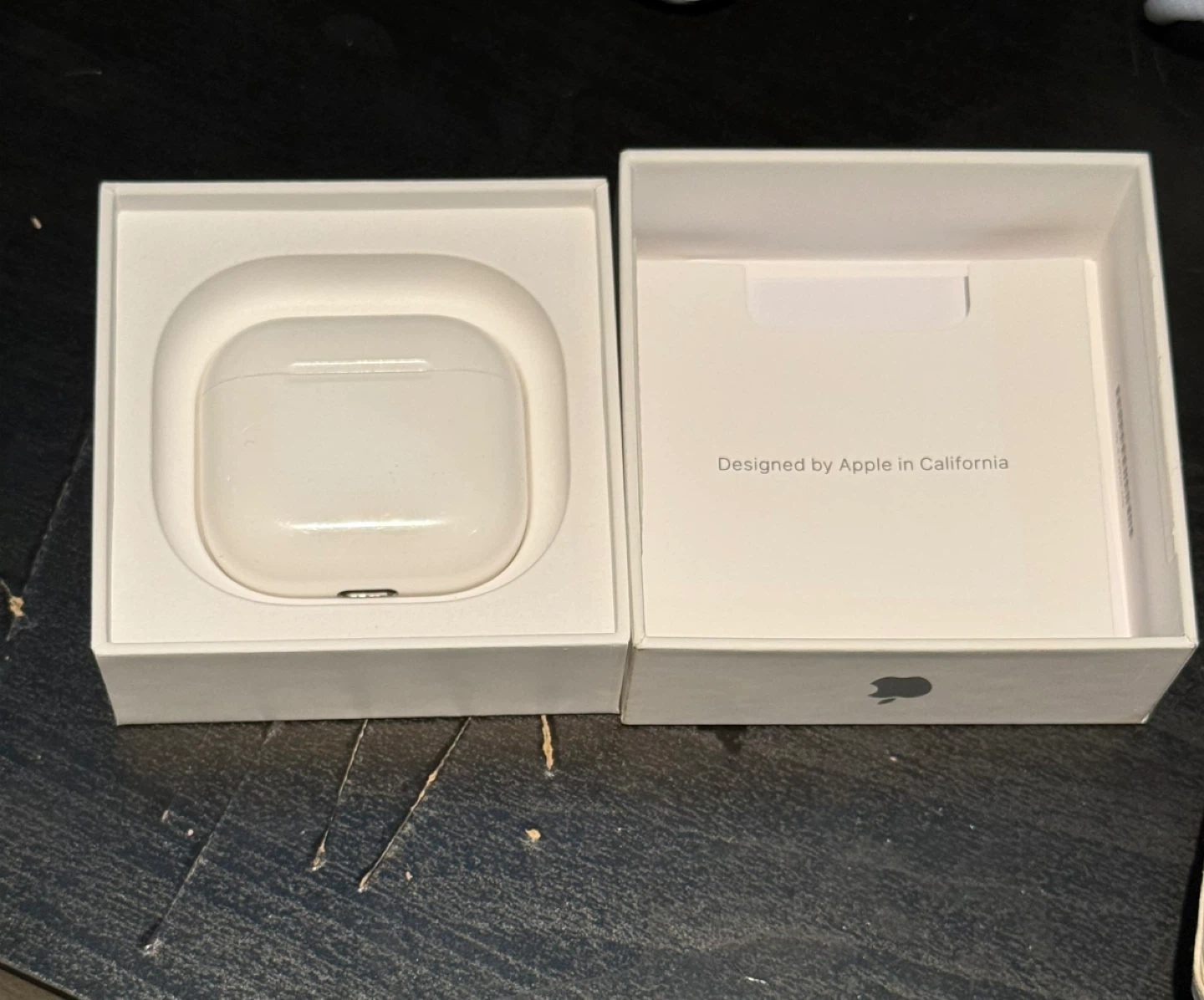 Apple AirPods 4 with Charging Case - photo 2