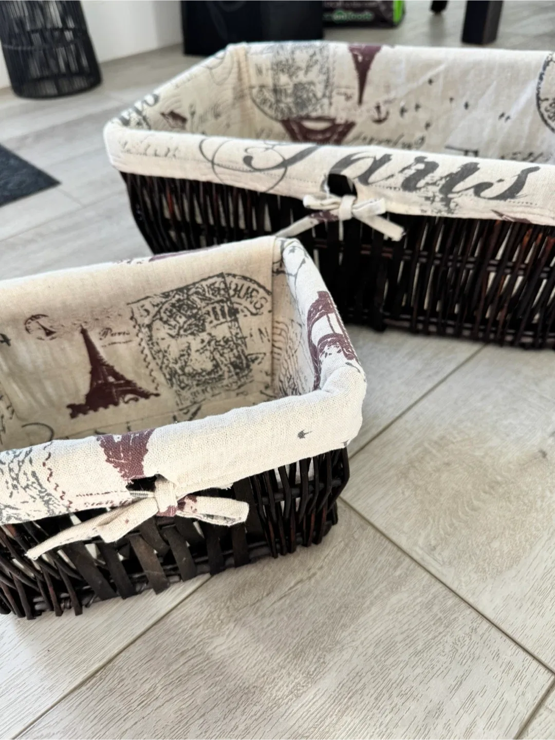Set of 4 Wicker Baskets with Paris-themed Liners image indicator(4)