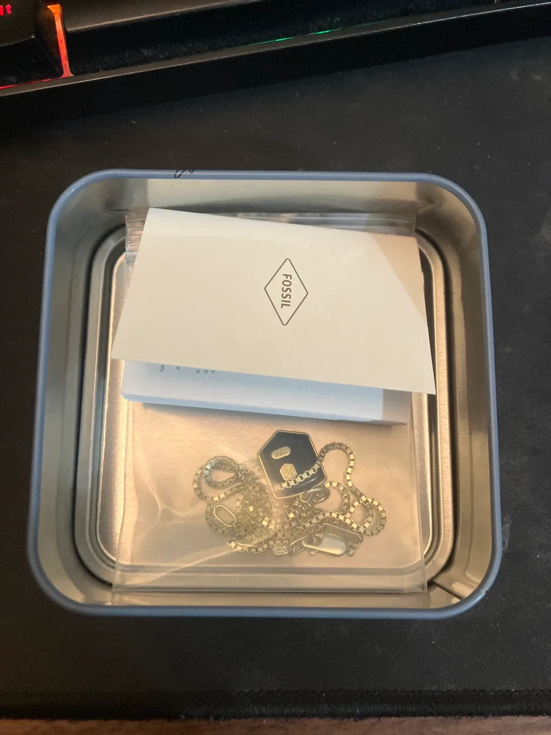 Fossil Gold Necklace with Black Pendant image indicator(2)