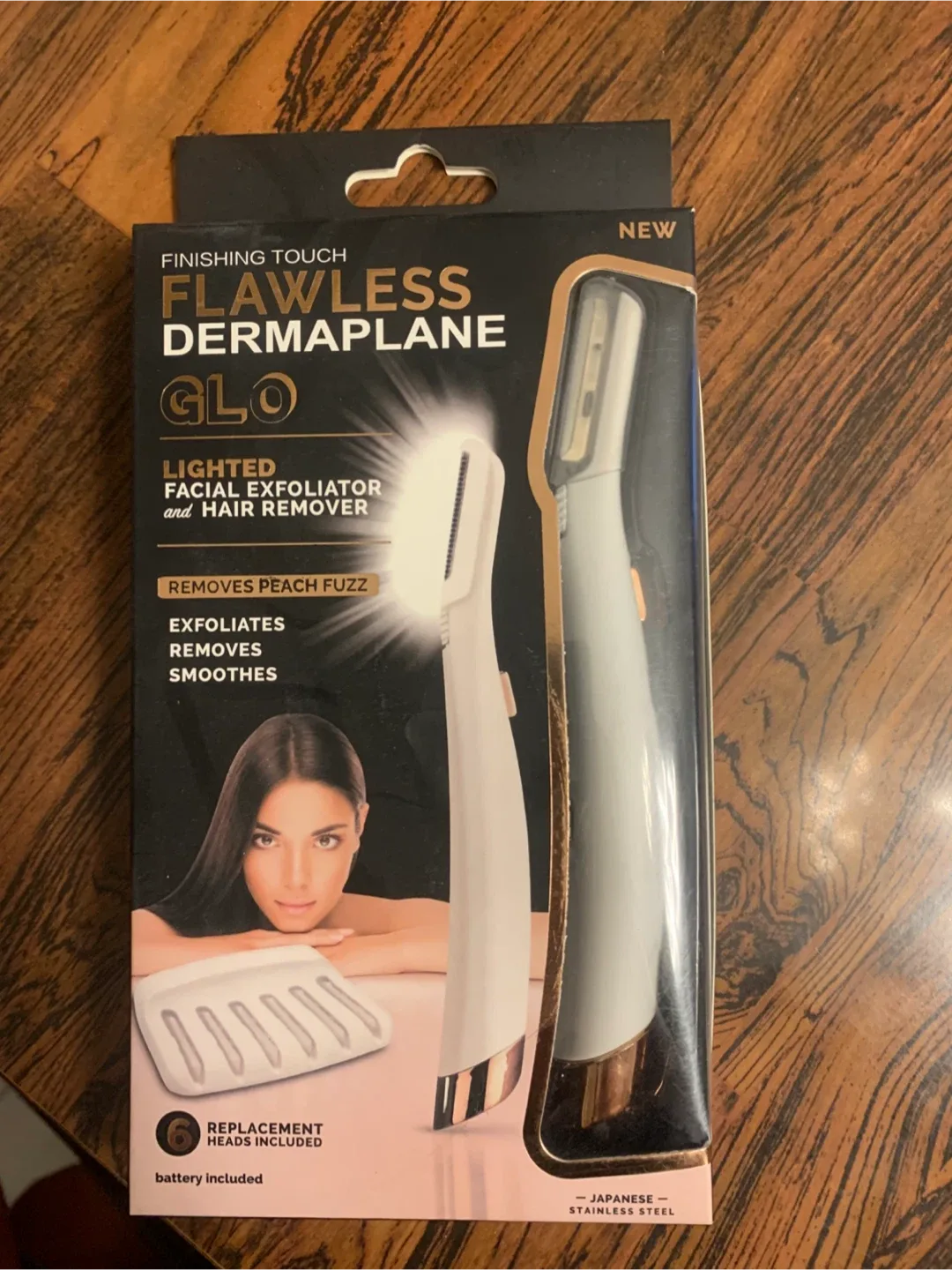 New Finishing Touch Flawless Dermaplane Glo