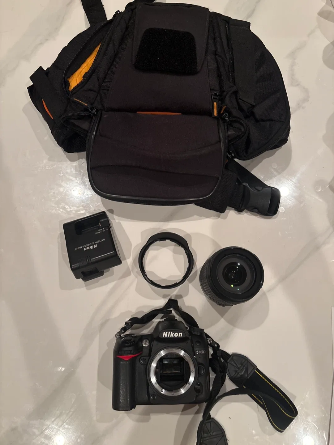 Nikon d7000 with 18-105mm lens, bag, and charger! image indicator(5)
