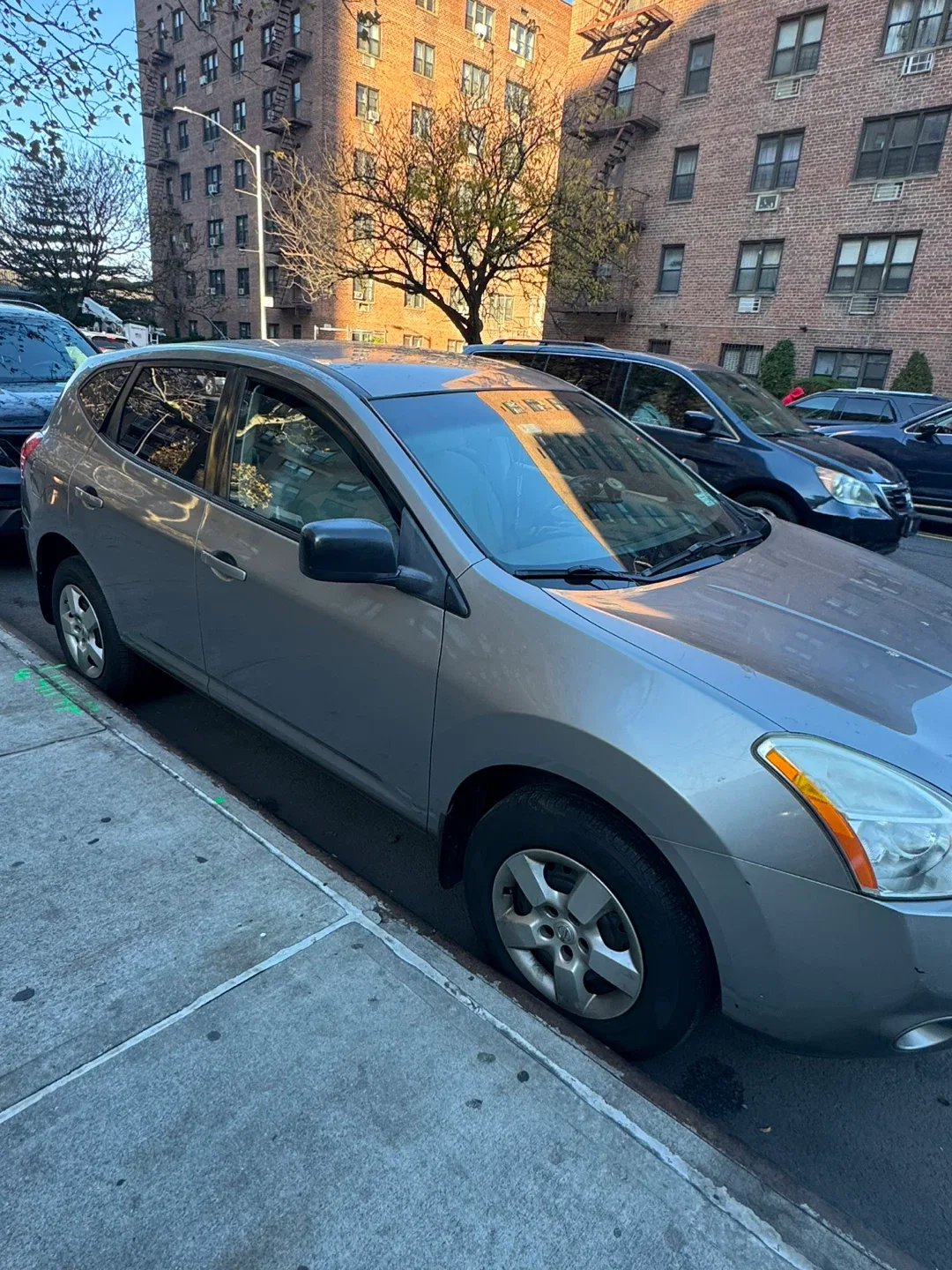 Gray Nissan Rogue S AWD image indicator(3)