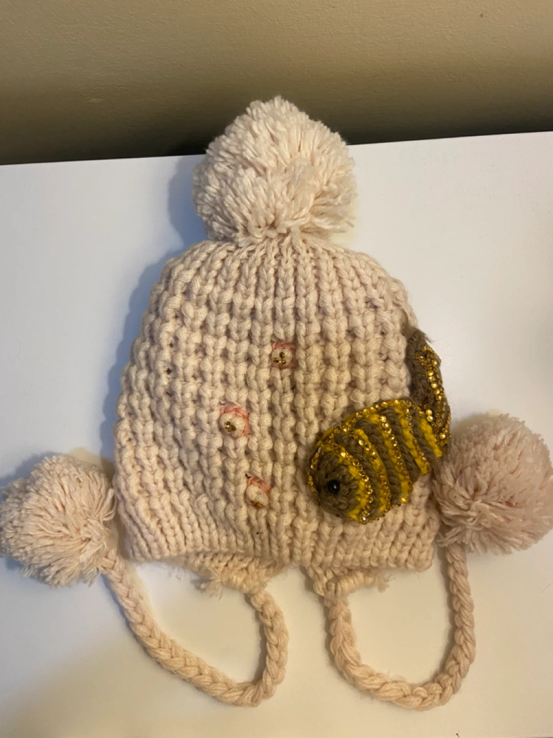 Hand-Knitted Cream Beanie with Pom Poms