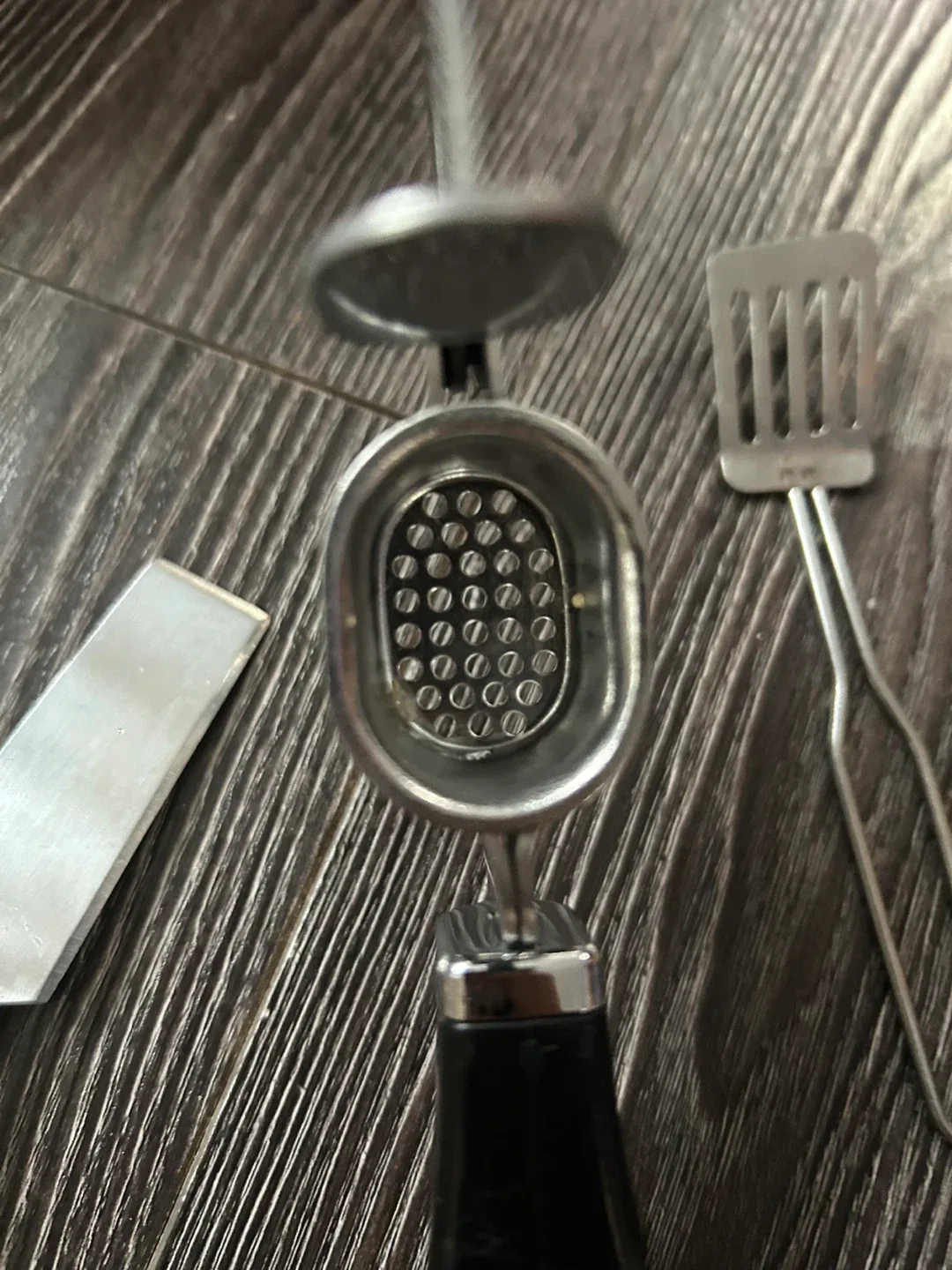 Garlic press ,cheese cutter small spatula and brush image indicator(6)