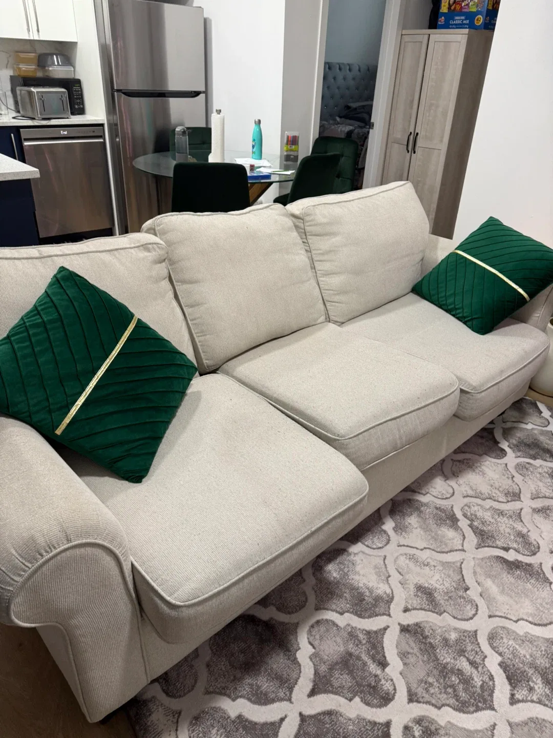 Beige Sofa with Green Pillows image indicator(2)