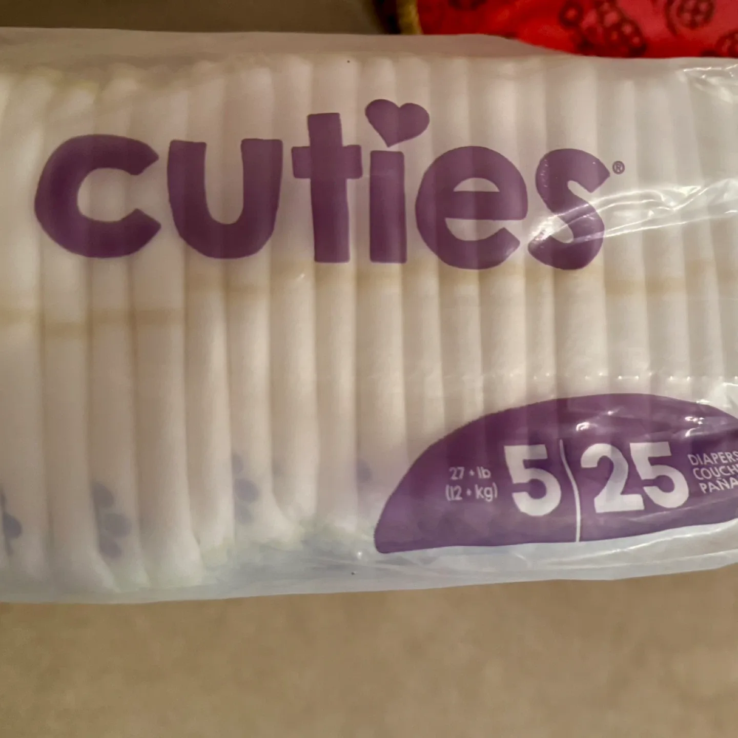 Cuties Complete Care Diapers, Size 5 (27+ lb) image indicator(2)