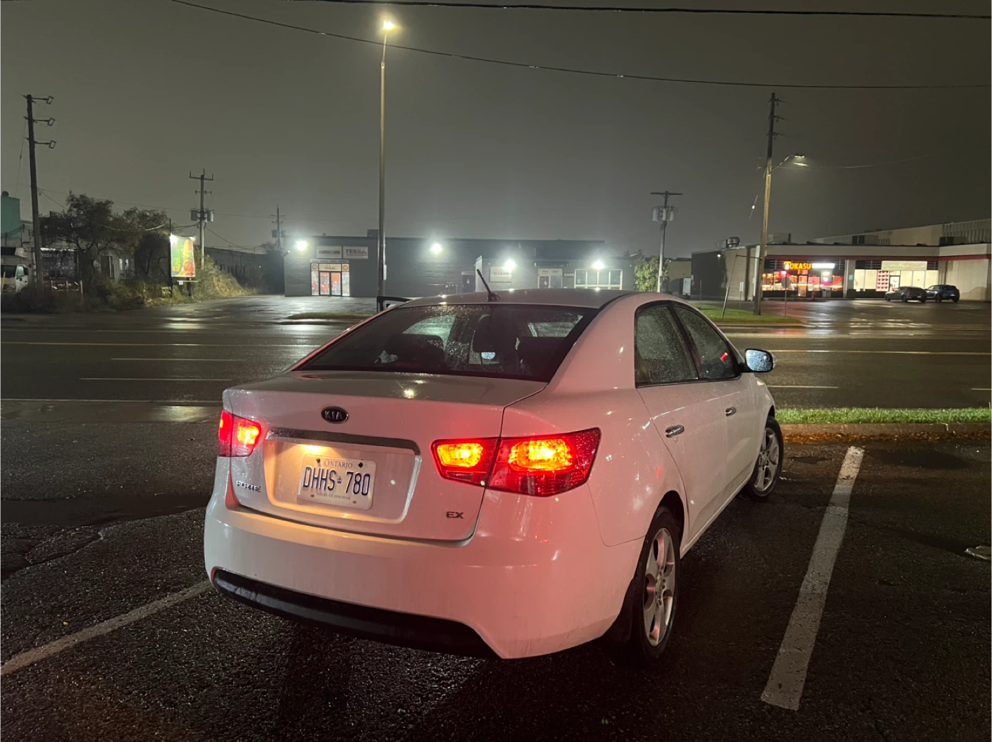 Kia Forte - White Sedan