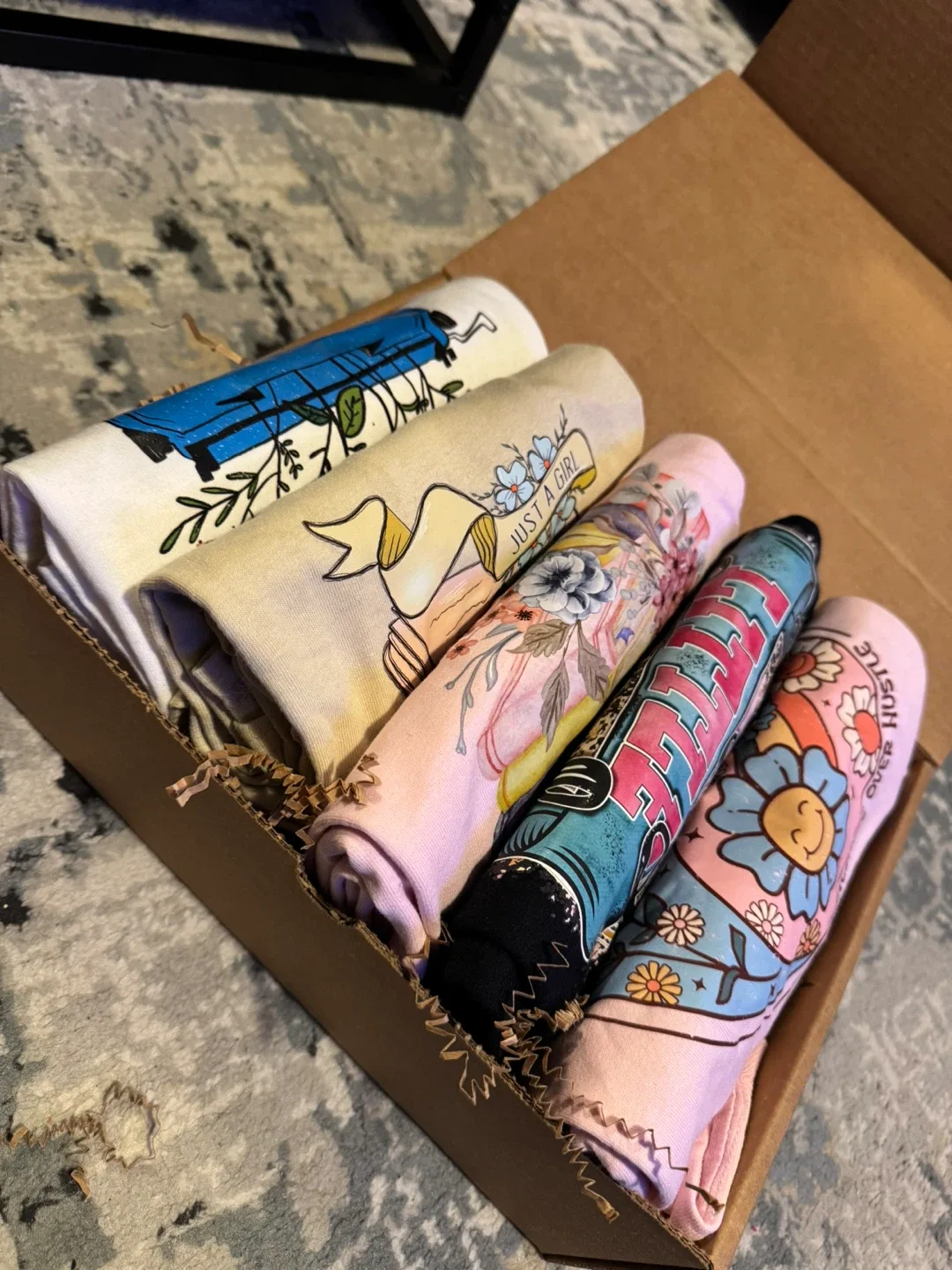 Box of Graphic T-Shirts image indicator(2)