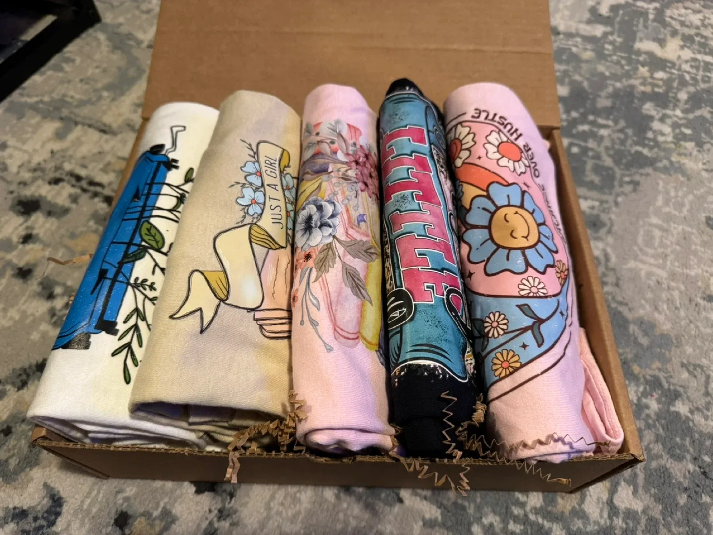 Box of Graphic T-Shirts