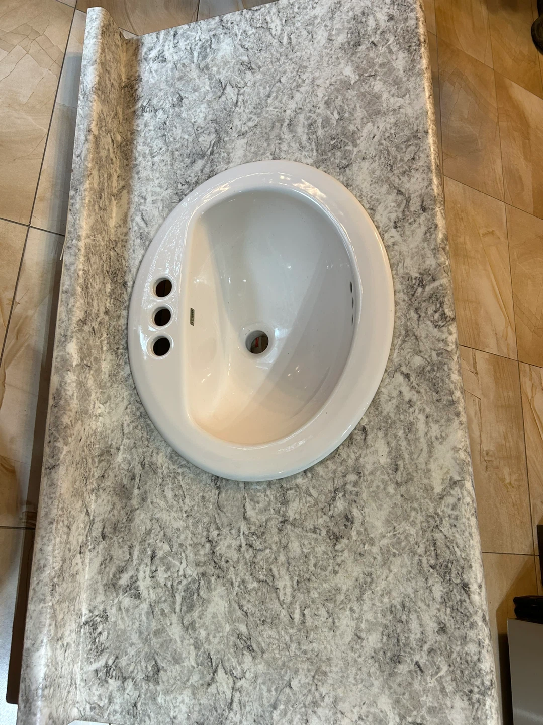 Crane White Oval Bathroom Sink with wood Counter