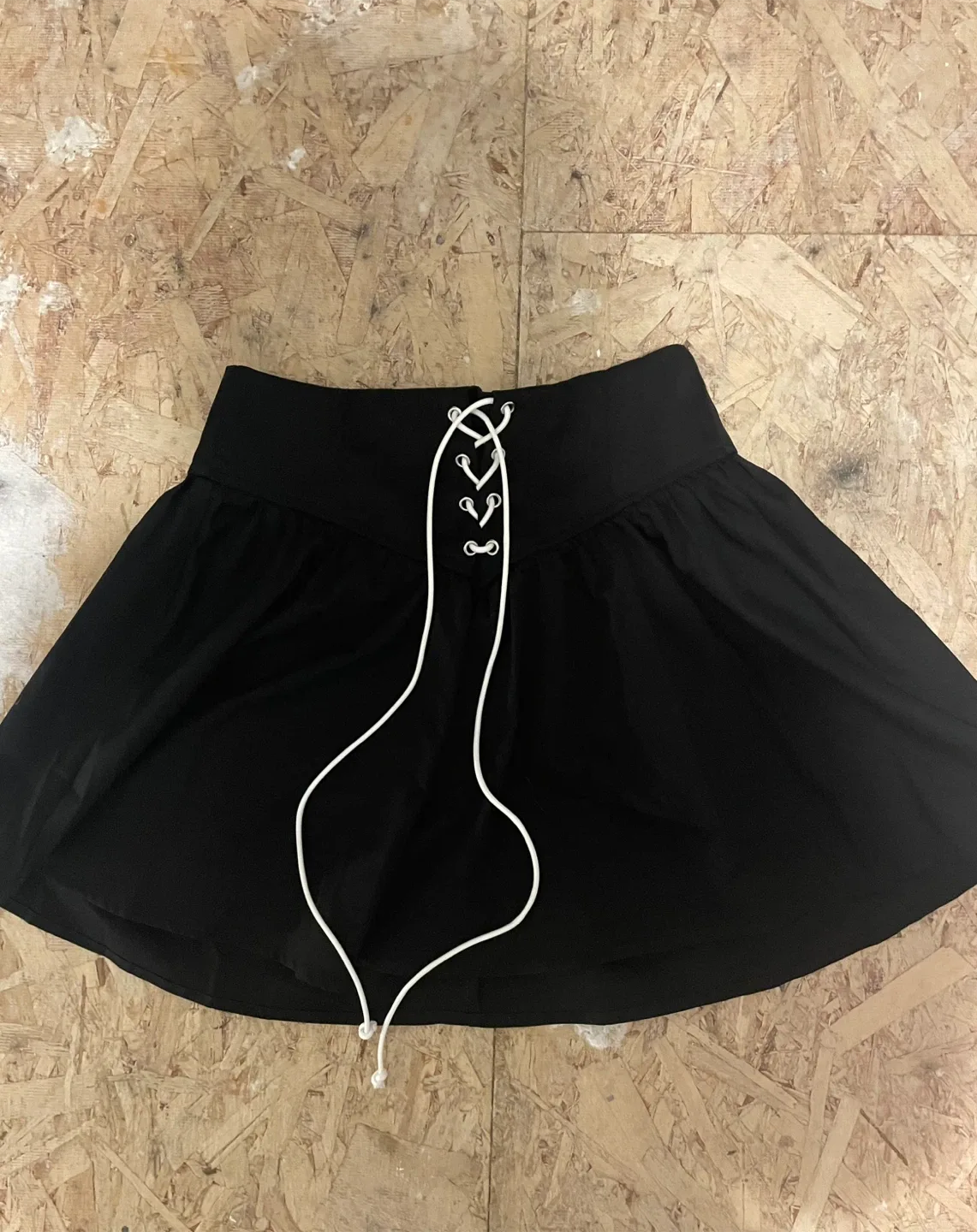 Black Mini Skirt with Lace-Up Detail image indicator(3)