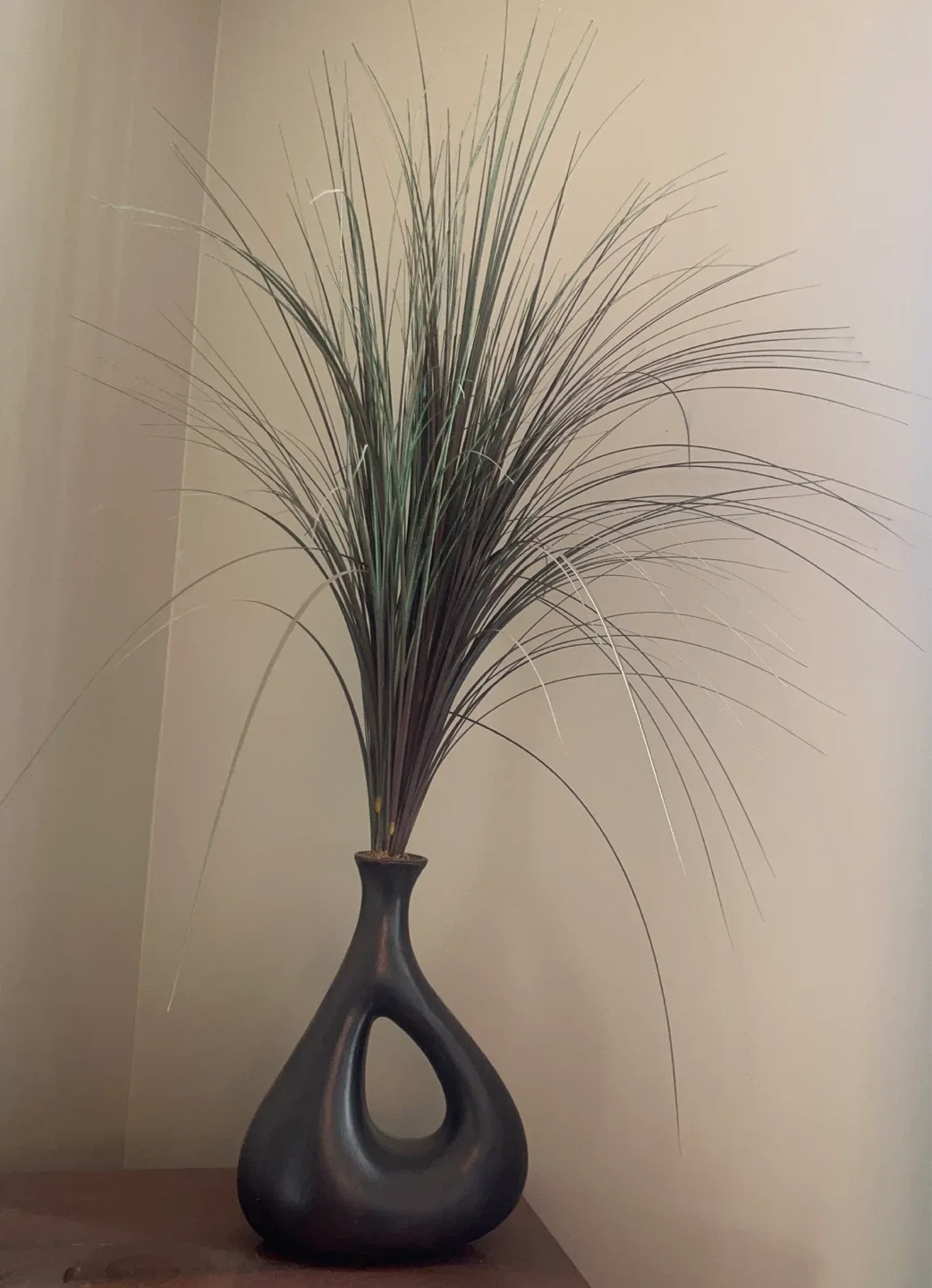 Black Vase with Decorative artificial Grass