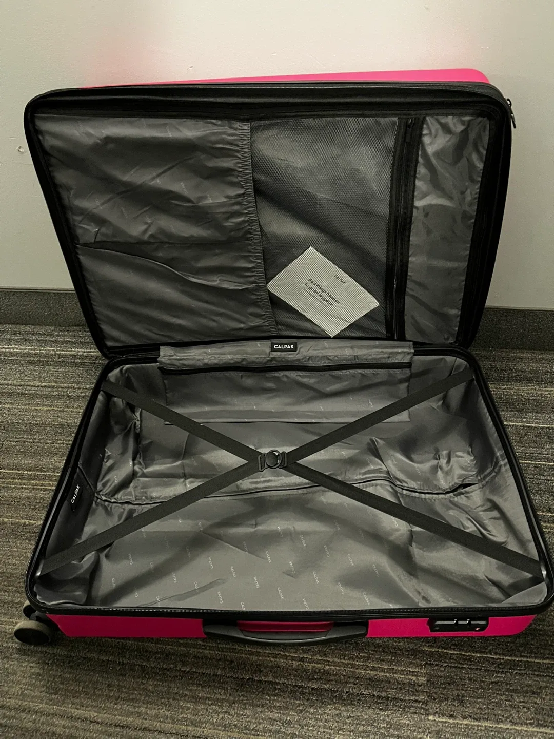 CALPAK Pink Hardshell Suitcase Large image indicator(9)