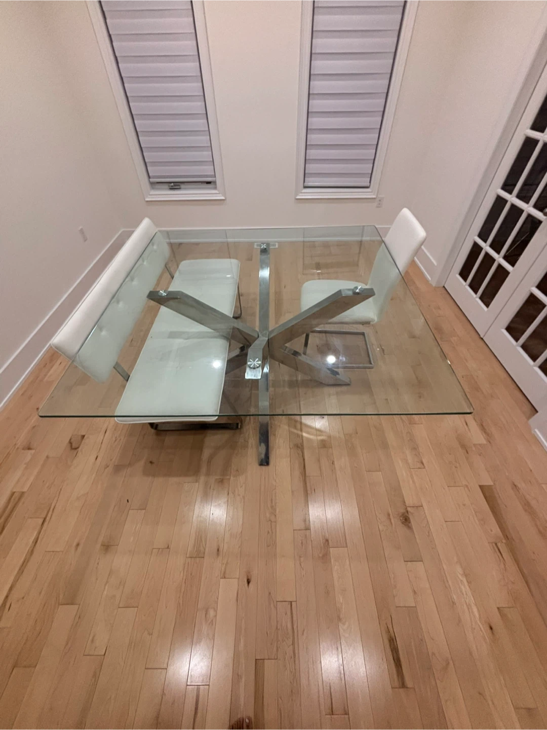 Glass Dining Table with White Chairs