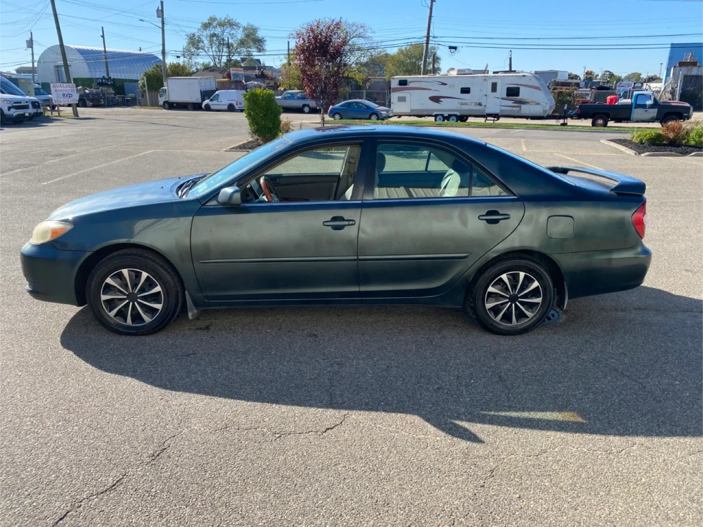 Toyota Camry LE - Green Sedan
