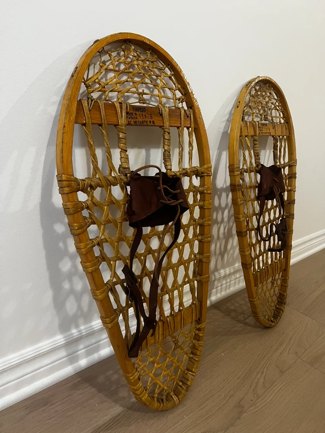 Vintage 1970s oval wood and rawhide snowshoes thumbnail