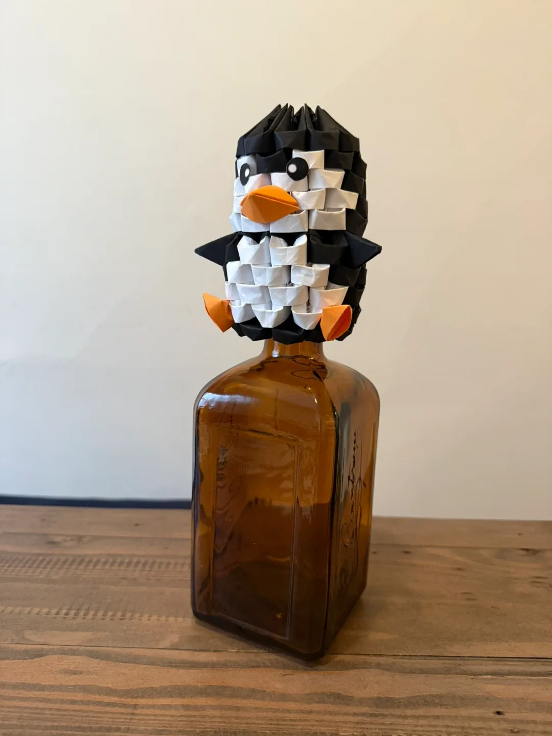 Handmade paper penguin wine bottle topper