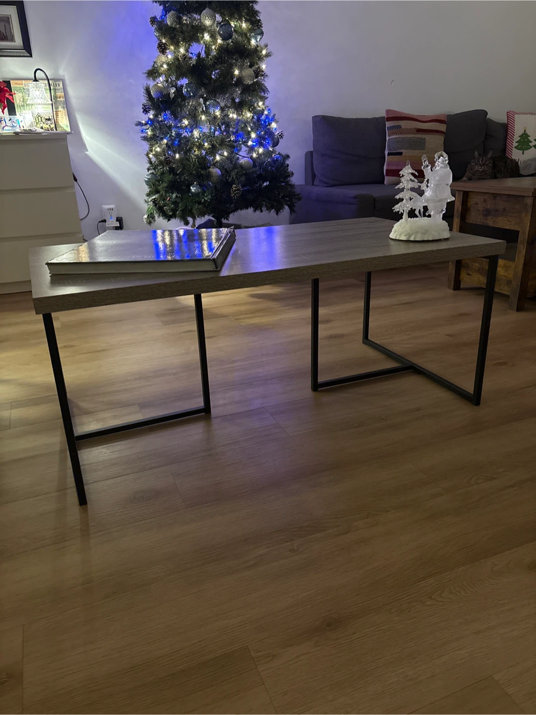Coffee Table - Wood grain top, black metal legs