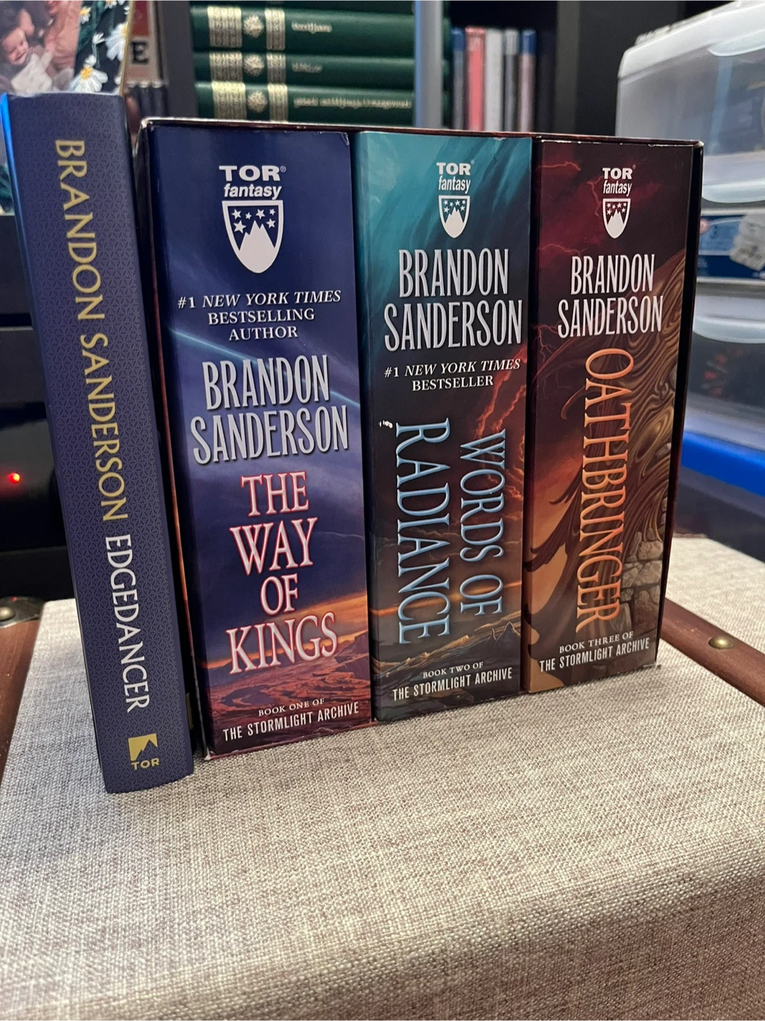 Brandon Sanderson trilogy + extra book (Edgedancer)