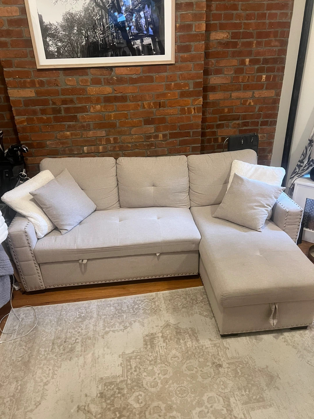 Small Beige Sectional Sofa with Pullout Sleeper