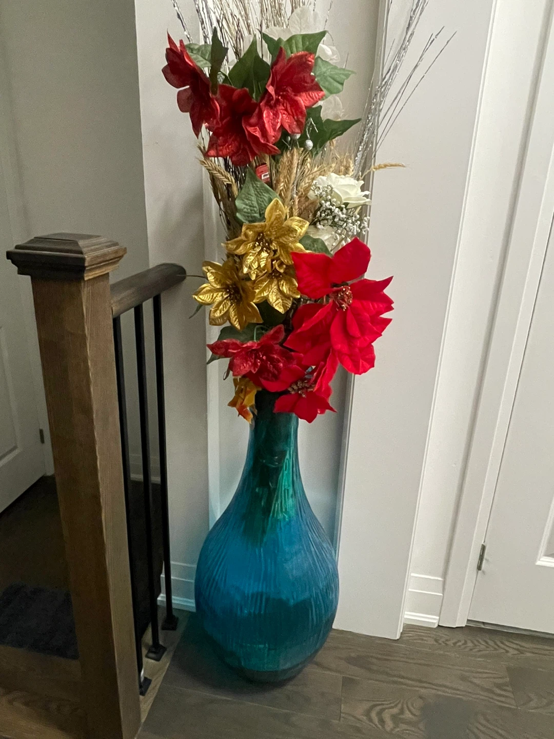 Decorative Floral Arrangement in Blue Vase