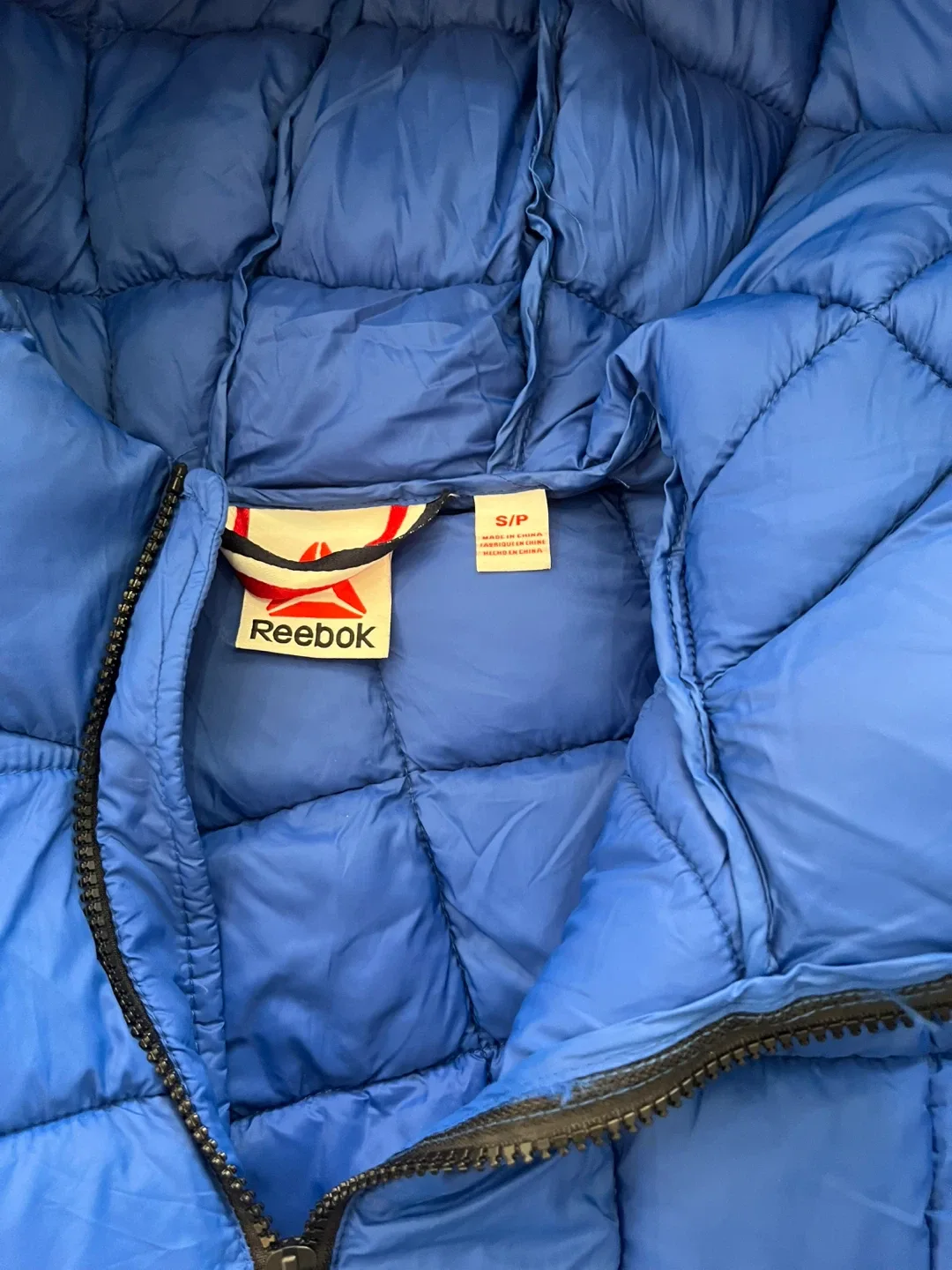 Brand new with tag Reebok Blue Puffer Jacket image indicator(6)