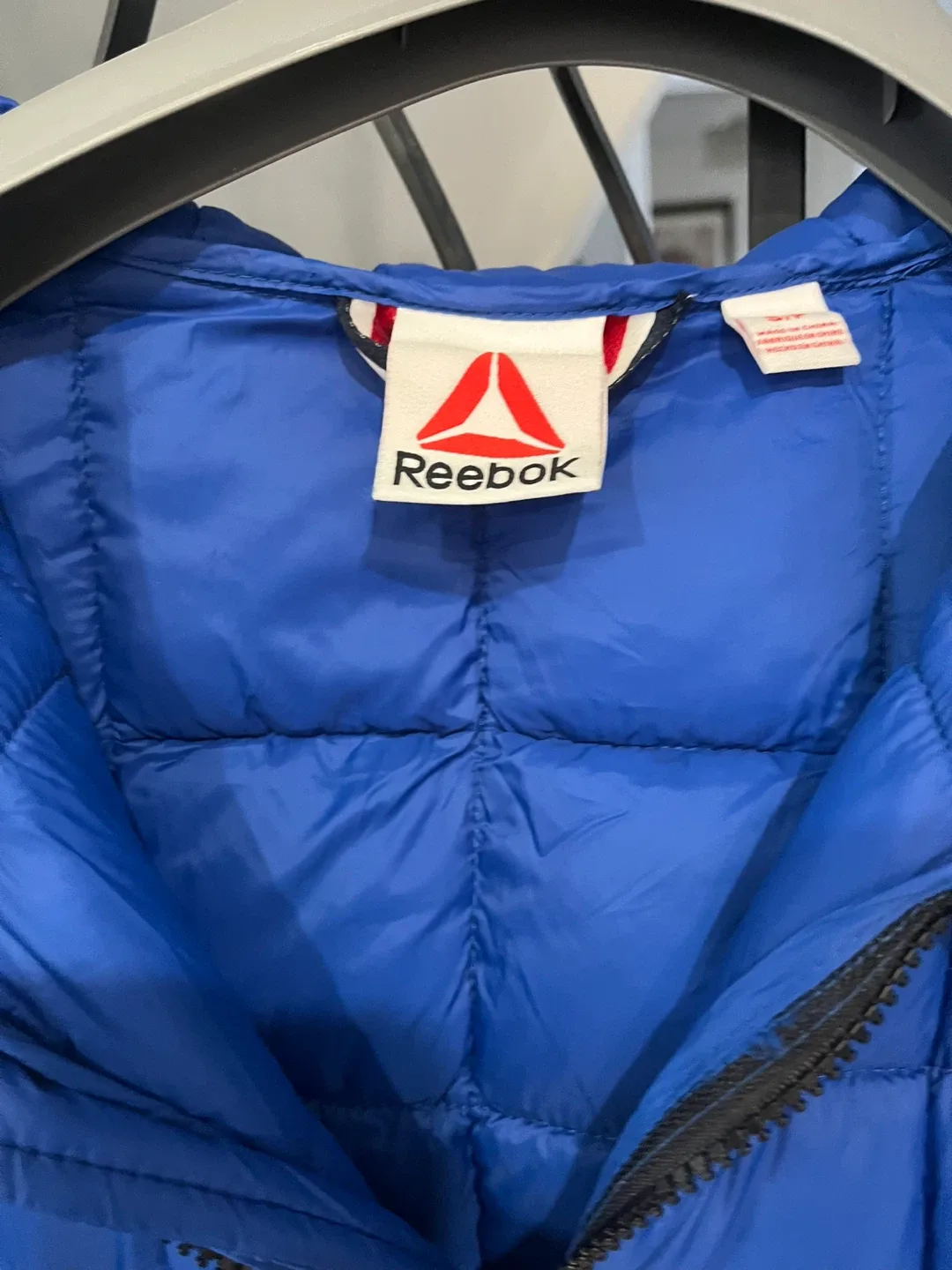 Brand new with tag Reebok Blue Puffer Jacket image indicator(4)