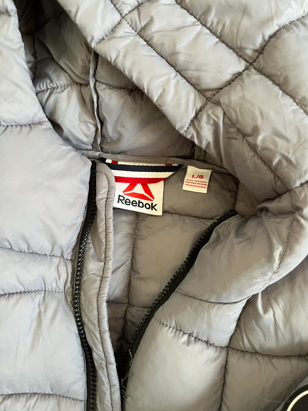 Brand new with tag Reebok Puffer Jacket - Size L image indicator(3)